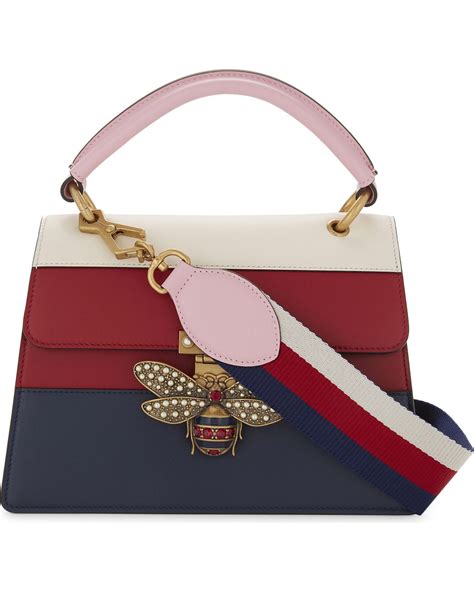 gucci bee stripe leather pouch|Gucci leather handbags.